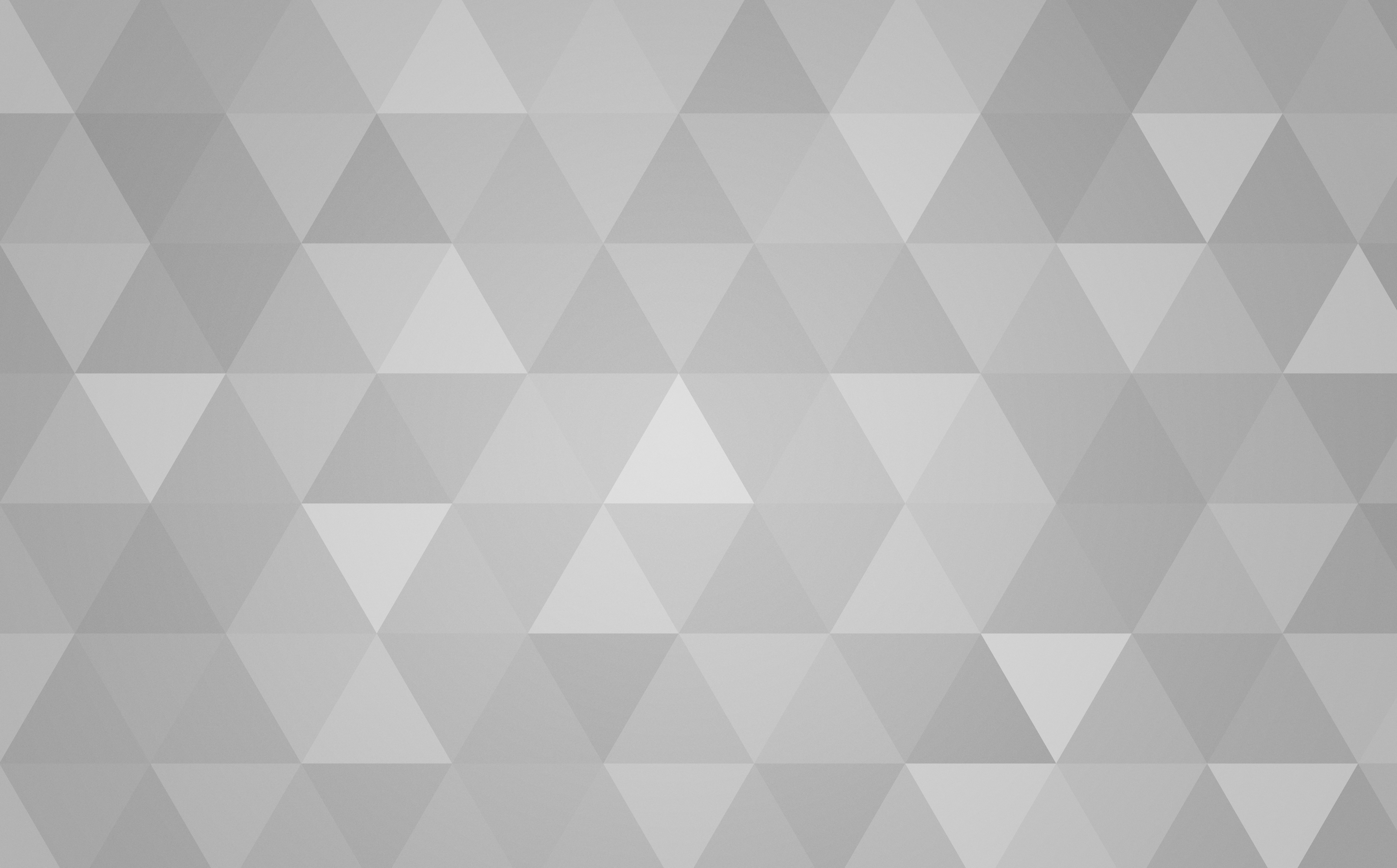 A background pattern of shaded interlocking triangles